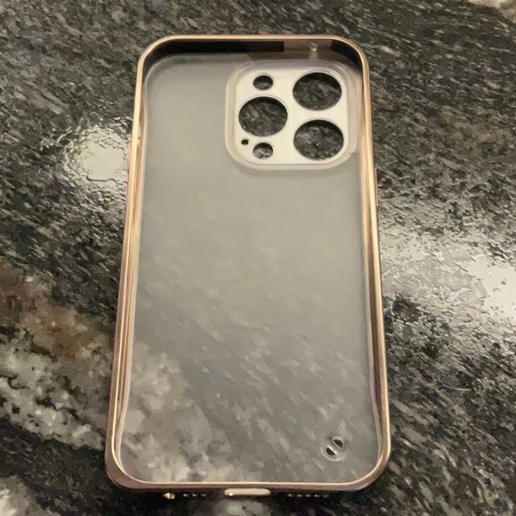 Like new iPhone 14 pro gold and clear metal case - Picture 2 of 3